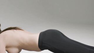 Busty young beauty working out while topless