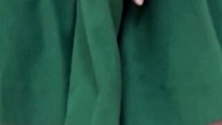 Asian cutie lifts her skirt up to show how she pees