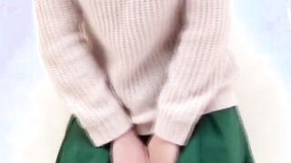 Asian cutie lifts her skirt up to show how she pees