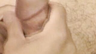 Hairy young guy tugs raging dick and cums all over the place