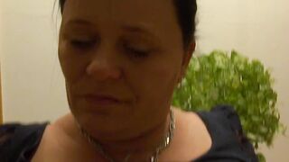 Tantalizing mature lady Melinda Moore takes her clothes off