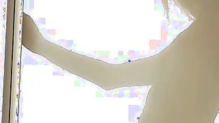 Gina Gerson does her morning stretches inside front of a backlit screen, and then finds Kristof Cale asleep and unable