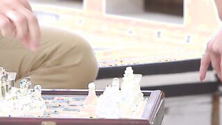 Chrissy Fox and Michael Fly start off their afternoon by engaging in a chess match, but Chrissy isn't really all