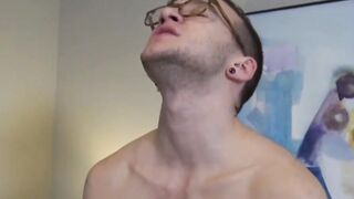 Inked FTM relaxes as his lover is playing with his pussy