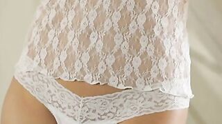 Wearing a sheer tank top and a g-string, Evfrat Mai wakes up one morning and