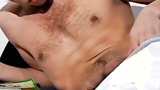 Sexy young gay man having a smoke while getting rammed