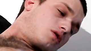 Sexy young gay man having a smoke while getting rammed