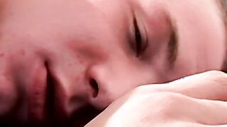 Sexy young gay man having a smoke while getting rammed