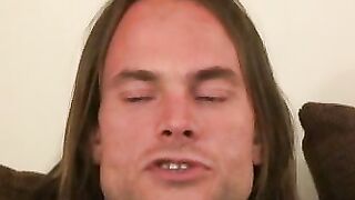 Long haired homosexual smokes a cigar before jerking off