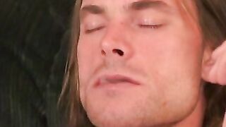 Long haired homosexual smokes a cigar before jerking off