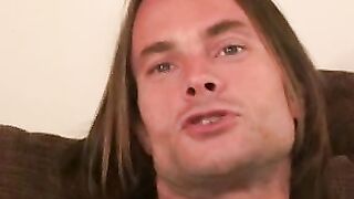 Long haired homosexual smokes a cigar before jerking off