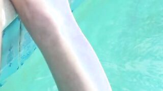 Codey Steele and Oliver Flynn are hanging out by the pool drinking while their girlfriends change into bikinis. By the