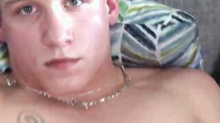 Mike looks into the camera with a sensual look while jerking