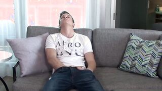 Mike looks into the camera with a sensual look while jerking
