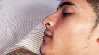 Handsome young guy grabs his hairy cock and jerks off solo