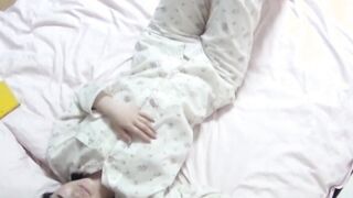 Secret camera films Japanese chick as she masturbates