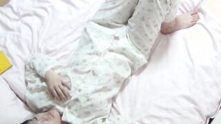 Secret camera films Japanese chick as she masturbates