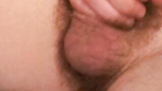 Hairy guy wastes no time jerking off and shooting jizz