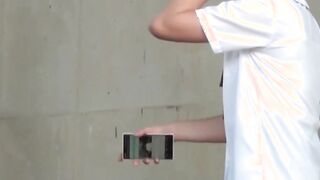 Two girls get caught pissing and filming each other outside