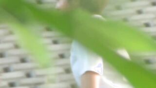 Two girls get caught pissing and filming each other outside