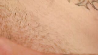 Bearded gay dude shows his tatts and strokes his dick solo