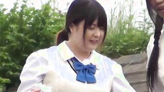 Outside pissing competition with two young Japanese pupils