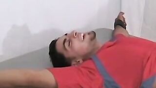Ticklish and sexy soccer player is bound on the table