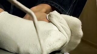 Young foot lover Clyde strokes his cock and cums on his feet