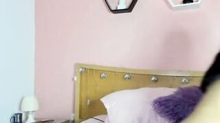 Small tits Colombian masturbates in bed on webcam