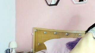 Small tits Colombian masturbates in bed on webcam