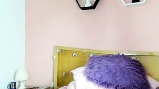 Small tits Colombian masturbates in bed on webcam