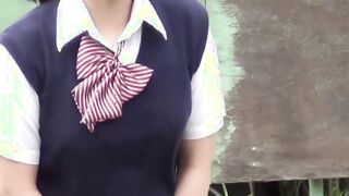 Naughty Japanese schoolgirls pissing in secret public place