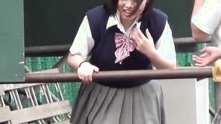 Naughty Japanese schoolgirls pissing in secret public place