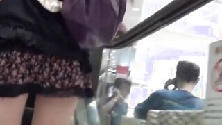 Real Japanese hotties taped up skirt while shopping