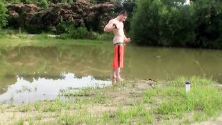 Straight naked jock goes out for a stroll in nature