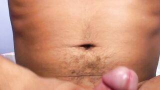Lusty gay dude grabs his giant dick and wanks until jizzing