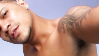Lusty gay dude grabs his giant dick and wanks until jizzing