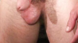 Guy with a mustache tugs his cock before cumming hard
