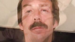Guy with a mustache tugs his cock before cumming hard