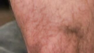 Guy with a mustache tugs his cock before cumming hard