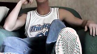 Young feet worshiper strokes his cock and cums on his feet