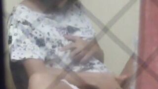 Hidden camera catches Japanese babe playing with herself