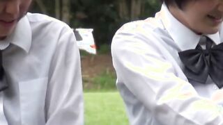 Cute Japanse schoolgirl with pigtails pisses in the wind