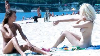 Ravishing nude beach girls tanning