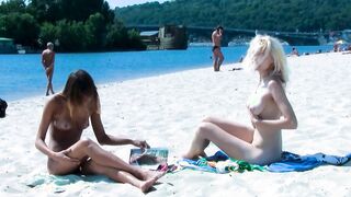 Ravishing nude beach girls tanning