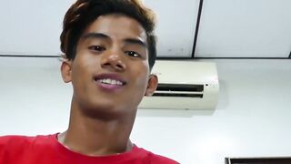 Cute little Asian twink enjoys toying with his cock and feet