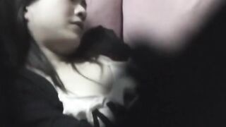 Japanese babe with hairy pussy filmed stroking it secretly