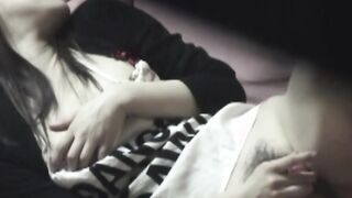 Japanese babe with hairy pussy filmed stroking it secretly