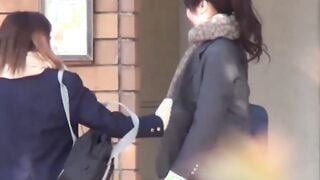 Japanese babe and her friend piss together out in public