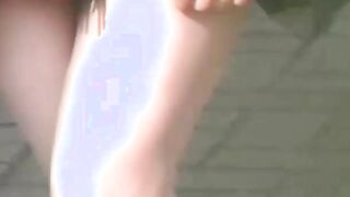 Japanese babe and her friend piss together out in public